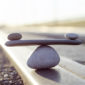 Symbol Scales is made of stones of various shapes Symbol Scales is made of stones of various shapes